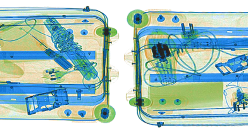 X-ray image of two suitcases and their contents.